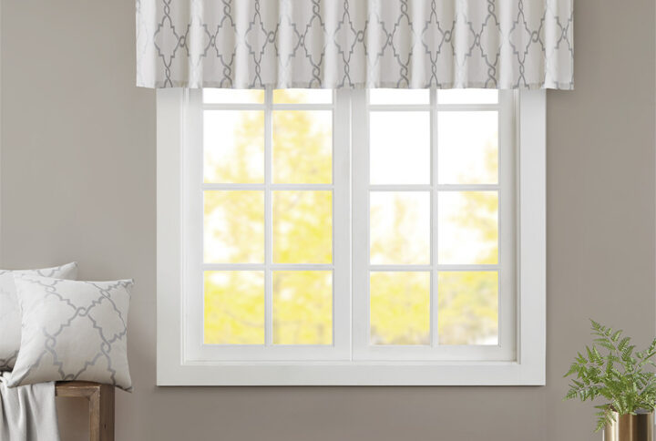 The Madison Park Saratoga Fret Print Window Valance is the perfect addition for a casual and stylish update to your home decor. This valance features a trendy metallic silver fretwork on a soft ivory ground