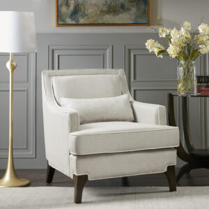 Refined and relaxed all in one chair. Cream upholstery is combined with contrasting ivory welting