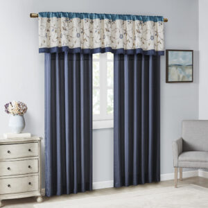 The Serene window panel adds a simple elegant touch to any room. The deep navy color combined with soft ivory and chocolate brown creates the perfect classic look. The panel features delicate floral embroidery and pleated details that add dimension. Added lining helps to filter light and provide some room darkening features. Panel is made with 3" rod pocket as well as back tabs; fits up to 1.25" diameter rod.