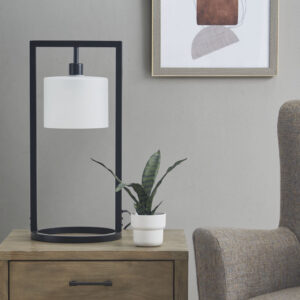 Illuminate your living room with the one-of-a-kind style of the INK+IVY Kittery Metal Table Lamp with Glass Drum Shade. Inspired by bold industrial designs