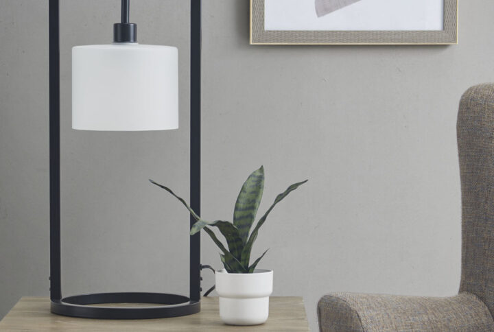 Illuminate your living room with the one-of-a-kind style of the INK+IVY Kittery Metal Table Lamp with Glass Drum Shade. Inspired by bold industrial designs