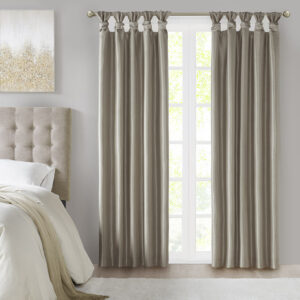 Energy efficiency meets a sophisticated style with the Madison Park Emilia Twist Tab Total Blackout Window Curtain. This window curtain panel showcases a DIY twist tab top finish that allows you to create an elegant display in your living room or bedroom space. The faux silk sheen base fabric features a 3 pass foamback liner on the reverse to block out all outside light