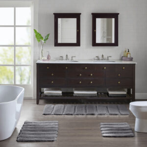 Transform your bathroom into a simple and stylish haven with our Madison Park Tufted Pearl Channel Rug. This solid tufted bath rug features a high-low stripe design with a light sheen and luster that adds rich dimension and texture for the perfect shabby chic touch your bathroom decor. Constructed from 100% macro-spun polyester fibers