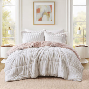 Sleep in the pure softness and comfort of the Madison Park Gia Back Print Long Fur Comforter Mini Set. The ultra-soft blush comforter flaunts a stylish brushed faux fur on the face that flips to a soft faux mink reverse