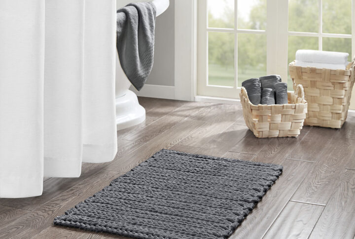 The Madison Park Lasso 100% Cotton Chenille Chain Stitch Rug provides a soft textural update to your bathroom decor. This cotton chenille bath rug features a woven chain stitch design that creates dimension and texture