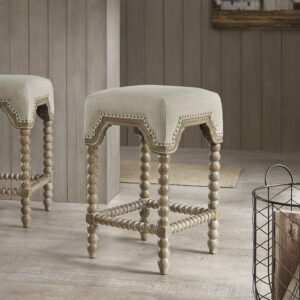 Bring an elegant farmhouse touch to your home with the Madison Park Christine Counter Stool. This square counter stool is upholstered in beautiful light grey fabric that features a bronze nail head trim for a rich accent. The solid wood turned legs and footrest displays a reclaimed grey wood finish to create a stunning transitional look. Accent your dining decor with this counter stool to complement your space with an elegant farmhouse allure. Assembly is required.