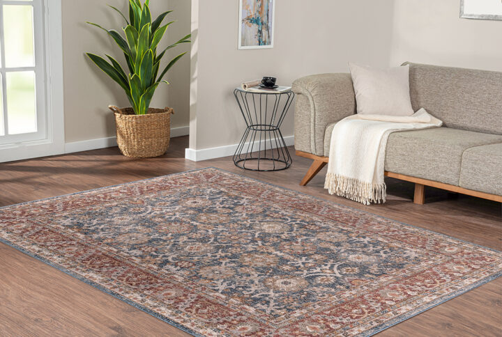 The Madison Park Faith Persian Bordered Traditional Blue and Red Woven Area Rug brings a touch of beauty to elevate your decor. This area rug features a traditional Persian design with a patterned border in rich shades of red and blue colors