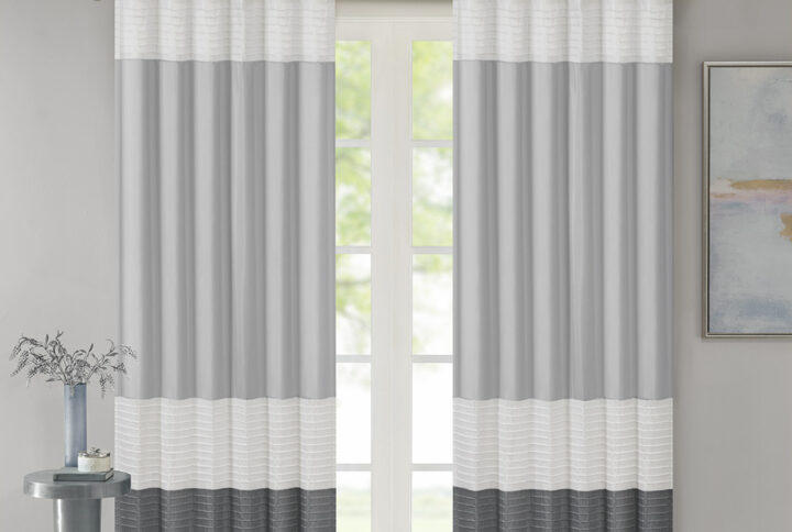 Amherst's modern color block design is a simple way to add style to your room. This window panel features color block stripes in neutral hues of grey and ivory