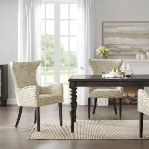 The Madison Park Angelica Dining Arm Chair 2 Piece Set brings a sophisticated update to your dining space. Each dining chair of this two piece set is upholstered in a rich tan fabric and features a bronze nail head trim for an added touch of elegance. A dark coffee wood finish on the straight legs creates a beautiful contrast with the upholstery. The round arms and high back flaunt elegant curves for a chic silhouette that gives your dining space a luxurious transitional touch. Leg assembly is required and tools are included for your convenience.