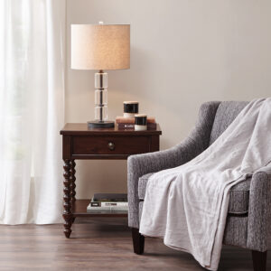 Complement your bedroom space with the Madison Park Signature Beckett Nightstand. This nightstand table features a morocco finish to create a warm and inviting look. A single drawer and lower shelf provide plenty of space for your bedside essentials. The turned solid wood legs add an elegant accent