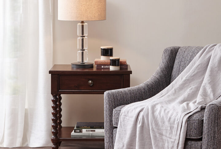 Complement your bedroom space with the Madison Park Signature Beckett Nightstand. This nightstand table features a morocco finish to create a warm and inviting look. A single drawer and lower shelf provide plenty of space for your bedside essentials. The turned solid wood legs add an elegant accent