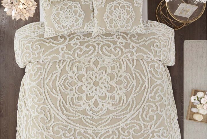 The Madison Park Laetitia Tufted Cotton Chenille Medallion Duvet Cover Set provides an alluring shabby chic update to your bedroom. This globally inspired duvet cover features a 100% cotton face and reverse with a tufted chenille medallion centered on top of the bed. The matching shams (1 in Twin/Twin XL size) coordinate with the cotton duvet cover to complete the boho look. Perfect for all season use