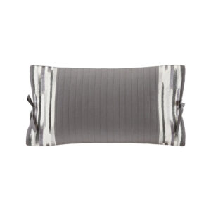 this decorative pillow brings a rich texture to the top of the bed. Bow-tie decorations add charm to the design