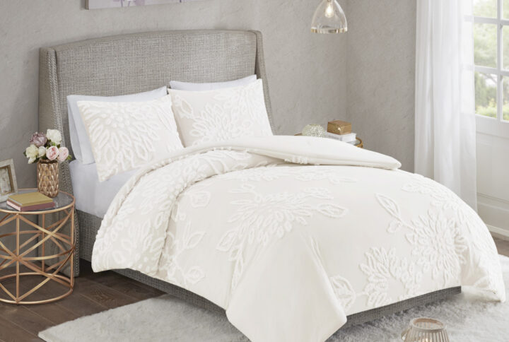 Complete your bedroom decor with the Madison Park Veronica 3 Piece Tufted Chenille Floral Comforter Set. The shabby chic comforter features off white cotton tufted chenille floral pattern on a off white ground that creates a soft cozy style. The 2 matching shams mirror the design of the comforter to complete the farmhouse aesthetic