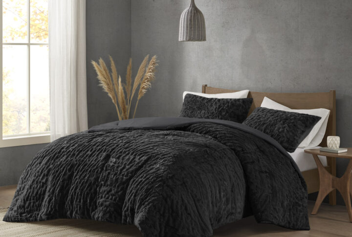 Add glamorous style and comfort to your bedroom with the Madison Park Blair Down Alt Ruched Faux Fur Comforter Set. This stylish comforter will liven up your bedroom with its unique texture and beauty. The face features a luxuriously soft faux fur with a stunning ruched design and a solid microfiber reverse. This bedding set includes 1 hypoallergenic polyester filled comforter and 2 shams to complete the look. This comforter set is also OEKO-TEX certified