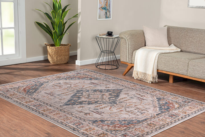 The Madison Park Jasmine Vintage Medallion Multi Woven Area Rug offers a sophisticated update to your home. This area rug features a beautiful vintage medallion pattern in rich tones of deep blue and orange