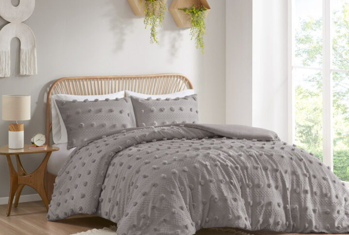 Refresh your bedroom with the elegant style of Intelligent Design's Lucy Clip Jacquard Duvet Cover Set. This beautiful duvet cover features fun and playful clip jacquard pompoms all over the face that add dimension to the top of the bed for a lovely look. The matching shams (1 in Twin/TwinXL) also flaunt the delicate design of the duvet cover to complete the jacquard bedding set. Machine washable for easy care