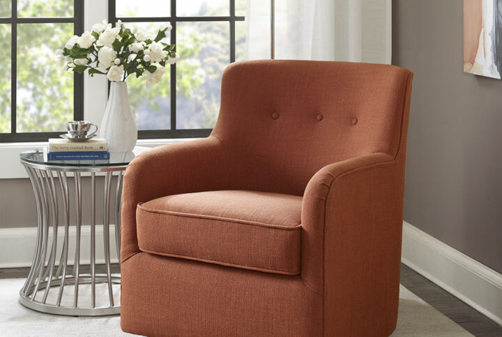 The Madison Park Adele Swivel Chair will add a touch of style and comfort to your home. Upholstered in a spice color fabric