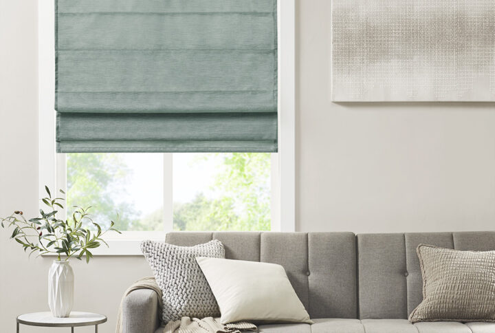 Our Madison Park Como Printed Faux Silk Room Darkening Cordless Roman Shade offers a modern and convenient update to your home decor. This roman shade flaunts a soft hue faux silk textured fabric to create a stylish and beautiful