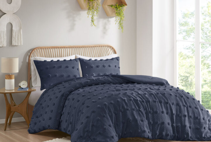 Refresh your bedroom with the elegant style of Intelligent Design's Lucy Clip Jacquard Comforter Set. This beautiful comforter features fun and playful clip jacquard pompoms all over the face that add dimension to the top of the bed for a lovely look. The matching shams (1 in Twin/TwinXL) also flaunt the delicate design of the comforter to complete the jacquard bedding set. Hypoallergenic polyester filling in the fashionable comforter contains no allergens and is treated to be dustproof. Machine washable for easy care