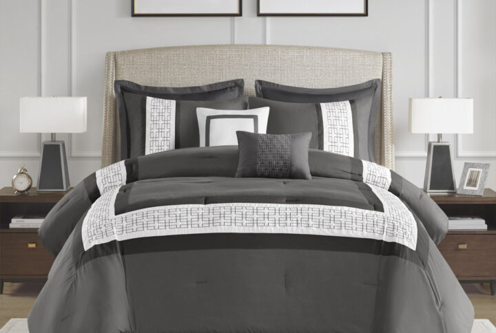 510 Design presents the Powell 8 Piece Embroidered Comforter Set to elevate your bedroom decor. This hotel style comforter features an embroidered and pieced border for a sophisticated and elegant design that easily coordinates with your space. The matching pillow shams also flaunt beautiful embroidery details. A solid bedskirt and 2 decorative pillows with embroidered details add the finishing touches to this hotel style bedding set. Hypoallergenic polyester filling in the comforter and pillows contains no allergens and is treated to be dustproof. Machine washable for easy care