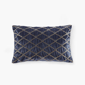 This sumptuous oblong pillow features foxtail stitched