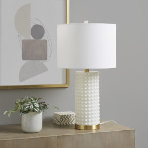 Add glamour to any room with the Gracy Ivy table lamp from Ink+Ivy. Its white glass and gold base give a sophisticated look