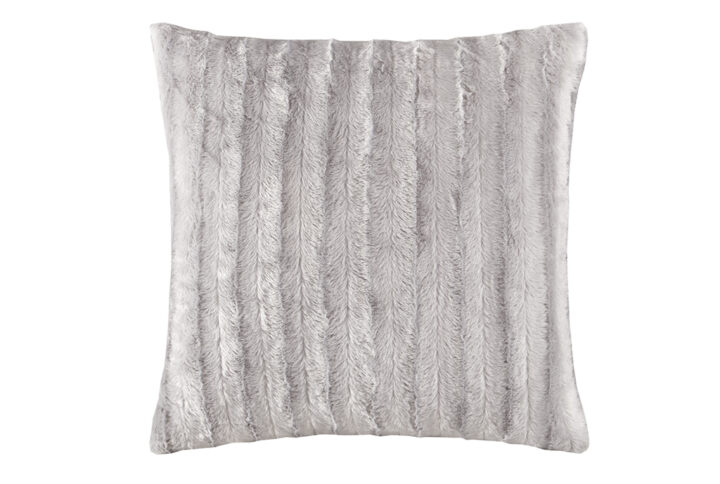 Indulge in luxury and comfort with this solid faux fur square pillow. Made from an ultra soft plush fabric