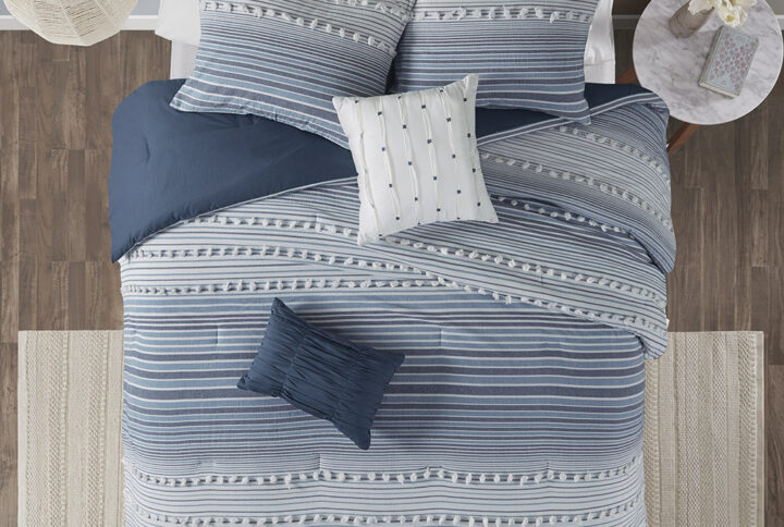 Give your bedroom a soft casual update with the Urban Habitat Calum Cotton Jacquard Comforter Set. The cotton clipped jacquard comforter features yarn-dyed stripes of blue