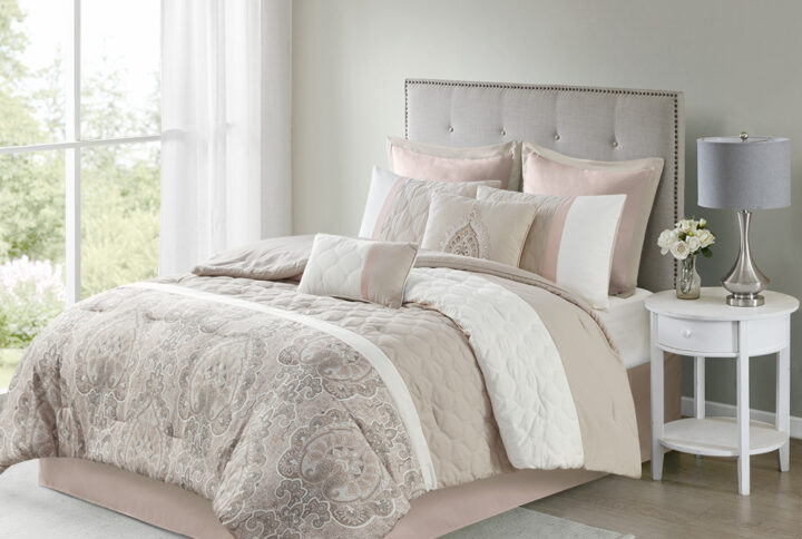 Update your bedroom with the refined elegance of 510 Design’s Shawnee 8 Piece Comforter Set. Showcasing a pieced design with diamond quilting details