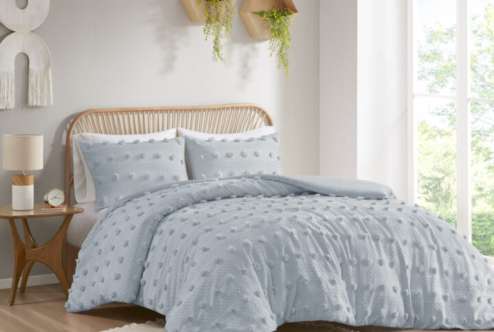 Refresh your bedroom with the elegant style of Intelligent Design's Lucy Clip Jacquard Duvet Cover Set. This beautiful duvet cover features fun and playful clip jacquard pompoms all over the face that add dimension to the top of the bed for a lovely look. The matching shams (1 in Twin/TwinXL) also flaunt the delicate design of the duvet cover to complete the jacquard bedding set. Machine washable for easy care