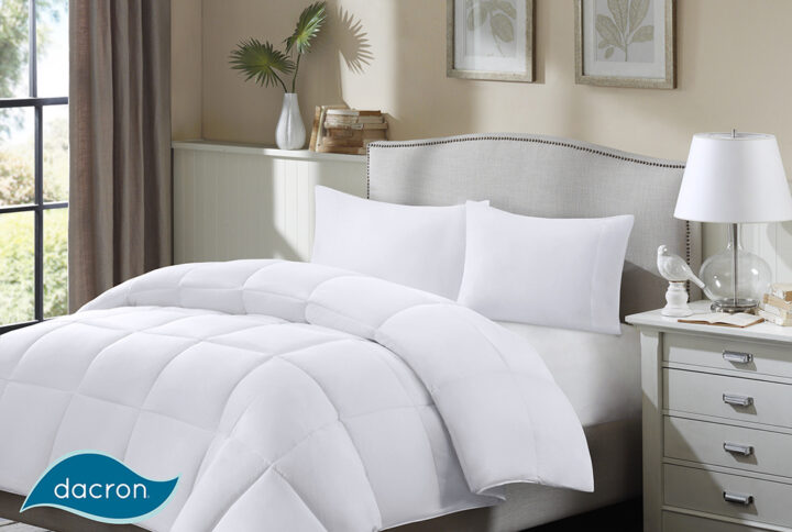 The cotton twill stain release down blend comforter features a specially blended luxurious fill of white down and resilient DACRON® branded fiber creating a lofty and beautifully rumpled comforter. It’s also treated with 3M Scotchgard providing stain release properties to keep your comforter looking plush and perfect. Finished with a sewn-through box construction that prevents the down-blend fill from shifting