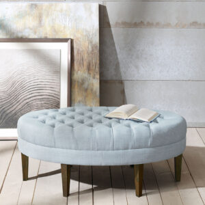 Prop up your feet and relax with the Madison Park Martin Surfboard Tufted Ottoman. This upholstered oval-shaped ottoman features a button tufted top that adds an elegant modern look. Solid wood straight legs with dark finish create a rich and striking contrast. Use this tufted ottoman as the perfect centerpiece in your living room to complete your decor. Only leg assembly is required. Spot clean or professional steam clean.