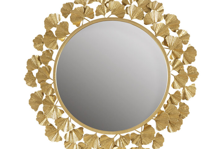 The Martha Stewart Eden Gold Gingko Leaf Round Wall Mirror 30.5" offers a beautiful accent piece to your home decor. This round mirror features a ginkgo leaf design metal frame in a textured antique gold foil finish to create luxurious transitional look. A keyhole hanging fixture on the back makes this mirror easy to hang in your entry way or living room. Part of the Martha Stewart Home decor Collection