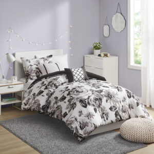 Transform your bedroom with the beautiful contrast of the Intelligent Design Dorsey Floral Print Comforter Set. The ultra-soft microfiber comforter and sham(s) flaunt a floral print in black and white for an elegant appeal. A solid black reverse on the comforter complements the top of the bed with a bold touch. Two decorative pillows with hypoallergenic filling are also included to complete the bedding set. Machine washable for easy care