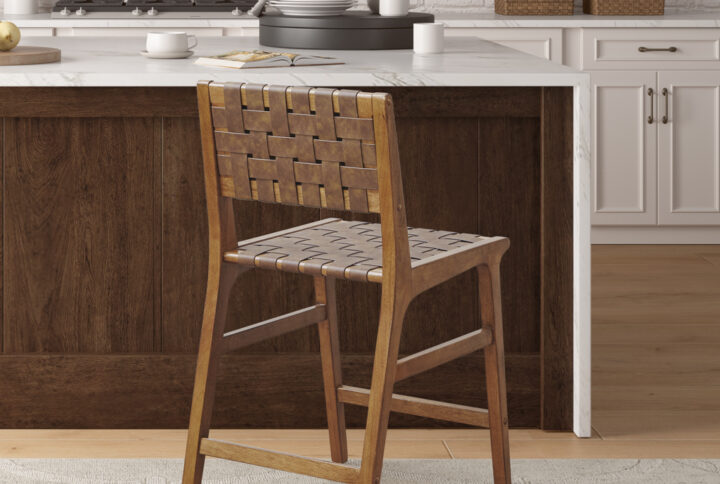 Add a touch of sophistication to your dining room with the Ink+Ivy Oslo woven counter stool. Made from durable faux leather and a sturdy solid wood frame