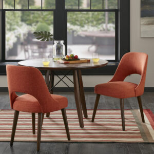 Dress up your dining room with the INK&IVY Nola Dining Chair. Upholstered in an orange fabric