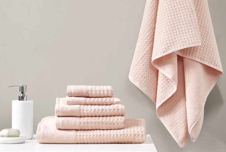 Our Madison Park Spa Waffle Cotton Towel 6 Piece Set provides the perfect textured update to your bathroom decor. This 100% cotton towel set features an all-over waffle combed jacquard design for a rich texture