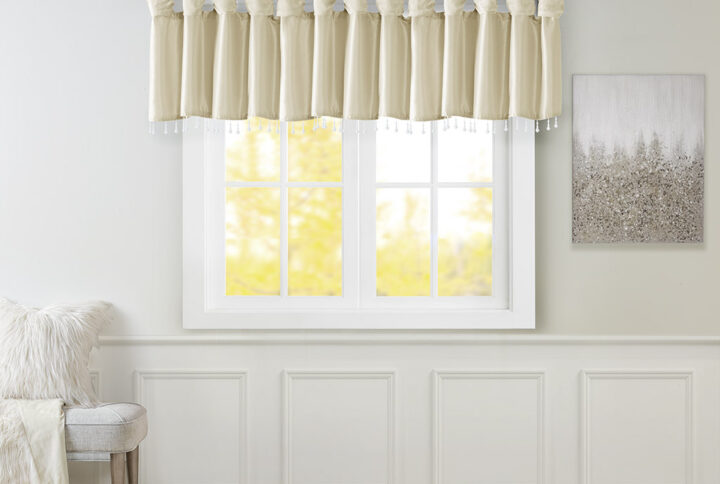 Give your home a decorator’s touch with the Madison Park Emilia Window Valance. Made from a faux silk fabric