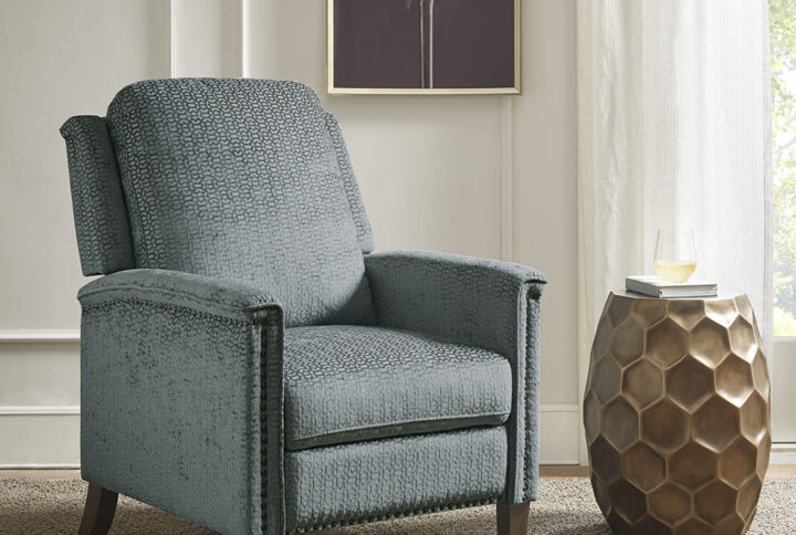 Update your living room with the comfort and style of the Madison Park Salina Push Back Recliner. This upholstered recliner features a high back with rounded arms