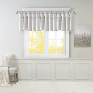 Give your home a decorator’s touch with the Madison Park Emilia Window Valance. Made from a faux silk fabric