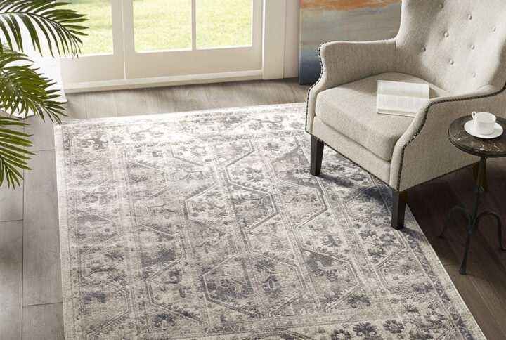 Complete your living space with the transitional allure of the Madison Park Dakota Tile Border Area Rug. This area rug features a soft