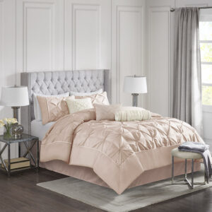 This beautifully tufted bed is from the Laurel Bedding Collection. It’s gorgeous