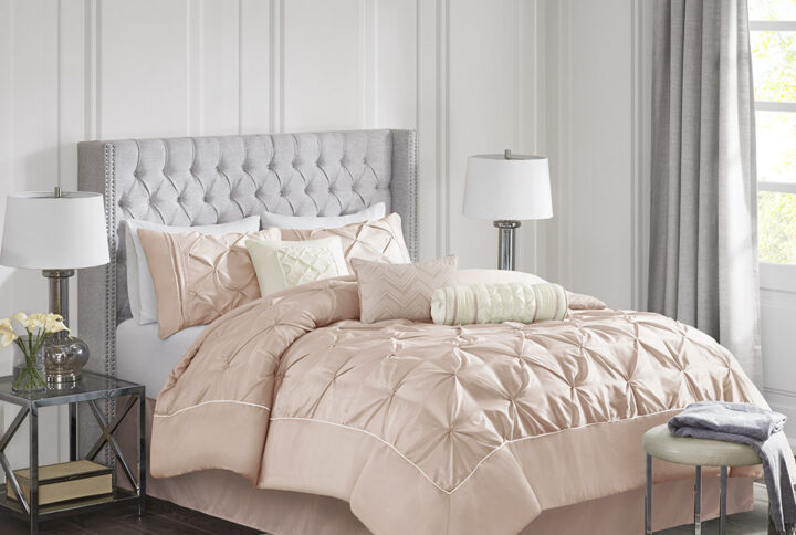 This beautifully tufted bed is from the Laurel Bedding Collection. It’s gorgeous