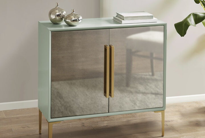 The Madison Park Curry 2 Door Accent Cabinet Elevates Your Home Decor With A Stunning Combination Of Style And Functionality. This Accent Cabinet Features A Pale Mint Green Case With Distressed Mirror Doors