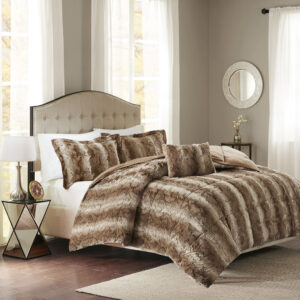 Snuggle up for a luxurious sleep with the Madison Park Zuri Comforter Set. This set features an ultra-soft faux fur front