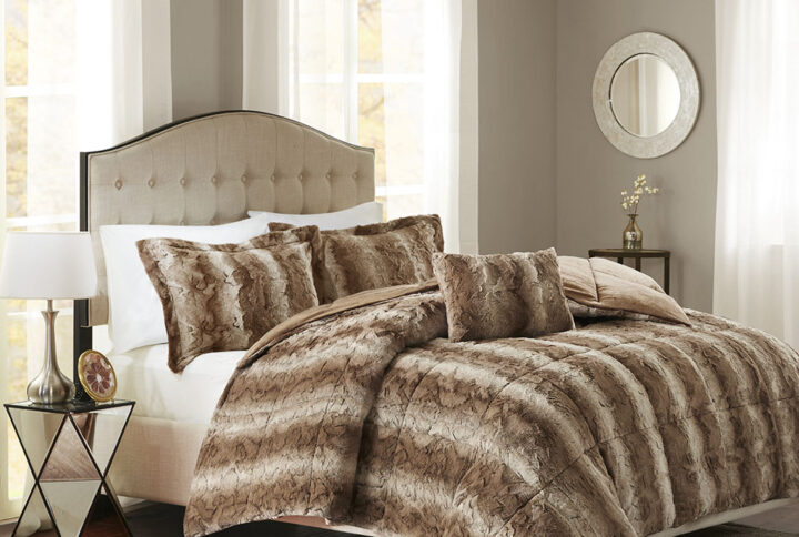 Snuggle up for a luxurious sleep with the Madison Park Zuri Comforter Set. This set features an ultra-soft faux fur front