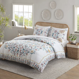 This shabby chic duvet cover set features a large floral print design in the center while blossoms line the edges of the comforter creating an enchanting border. Colors found in this bed set include various shades of teal