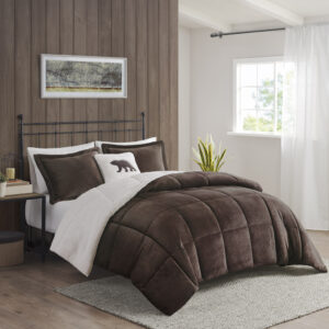 Bring the warmth and comfort of a cabin retreat to your bedroom with the Woolrich Alton Plush to Sherpa Down Alternative Comforter Set. Made from ultra-soft plush and reversing to a cozy berber