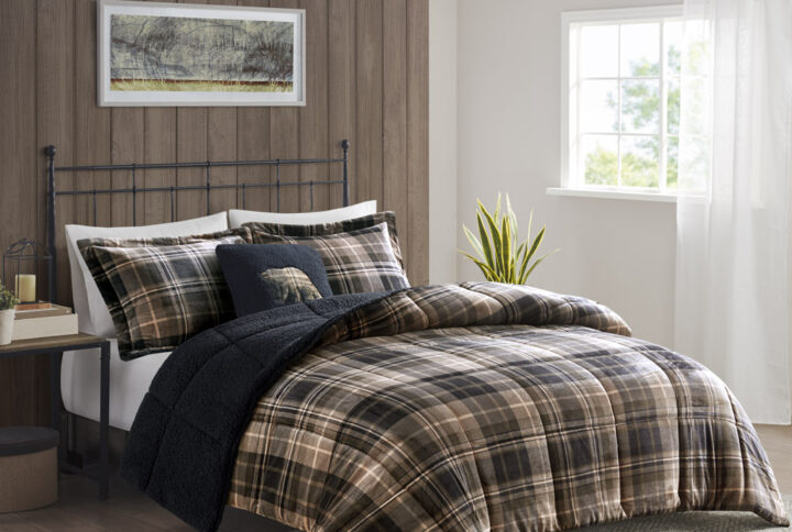 Bring the warmth and comfort of a cabin retreat to your bedroom with the Woolrich Alton Plush to Sherpa Down Alternative Comforter Set. Made from ultra-soft plush and reversing to a cozy berber